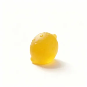 Single Lemon Squeezez THC lemon gummy 150mg on a white background – BudBuddies edible